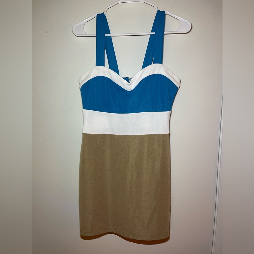 3/$15. Woman’s Medium Dress